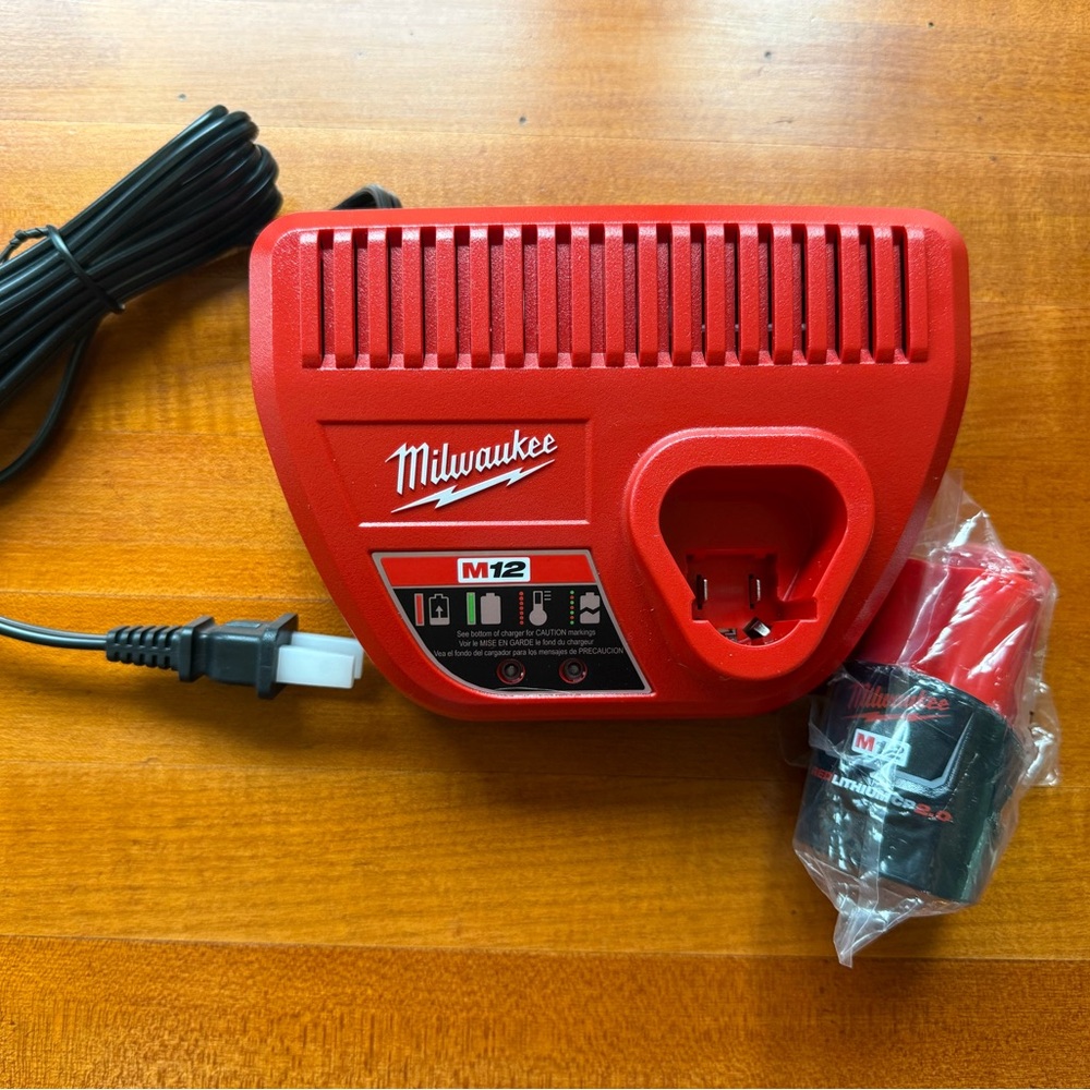 Milwaukee M12 Battery Charger and CP 2.0 Battery. New.